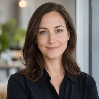 Realistic professional author portrait suitable for an editorial website, showing a neutral, approachable adult with professi